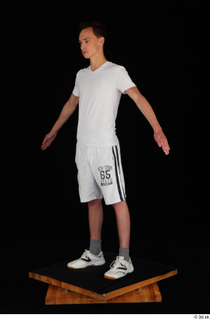  Johnny Reed dressed grey shorts sneakers sports standing white t shirt whole body 0010.jpg
